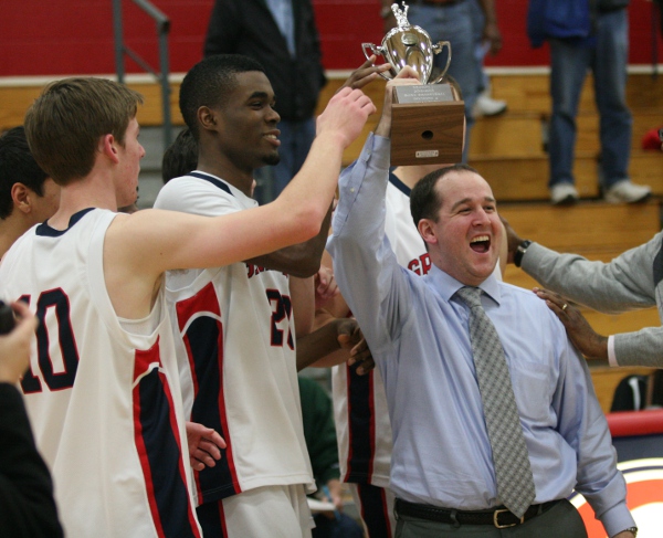 Head coach Jeremy Jordan (right) hopes to bring the Bay Rivers District title trophy back to Grafton. (File photo)