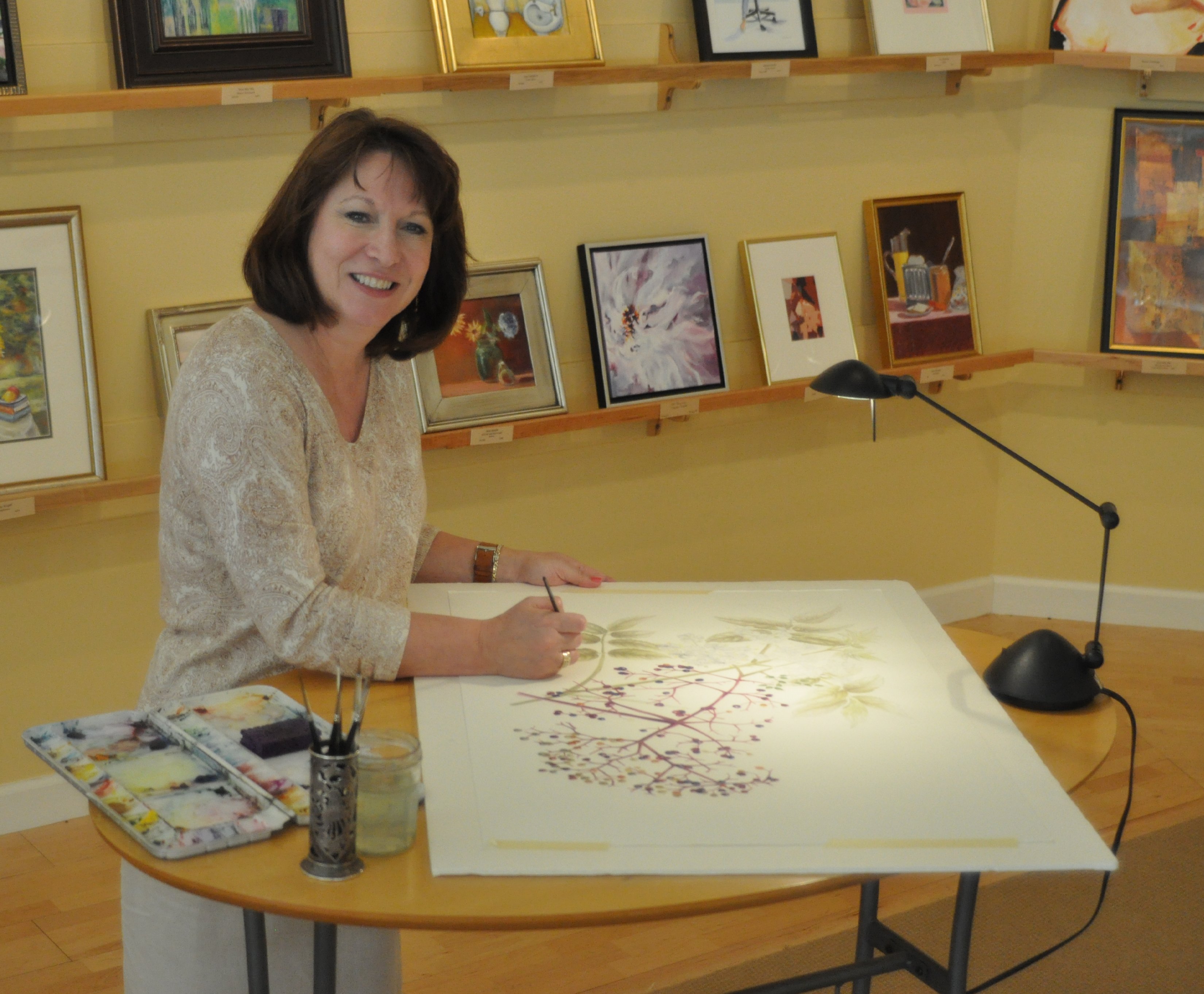 Linda Miller paints the XXX painting, shown below. (Photo courtesy Linda Miller)