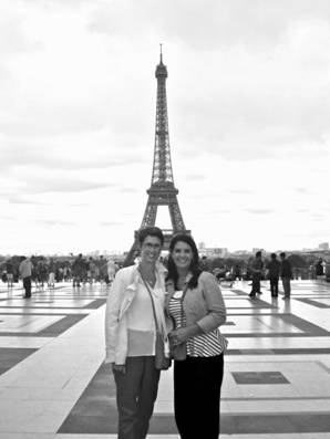 Lisa Krass and Molly Duffy pose in front of the Eiffel Tower.