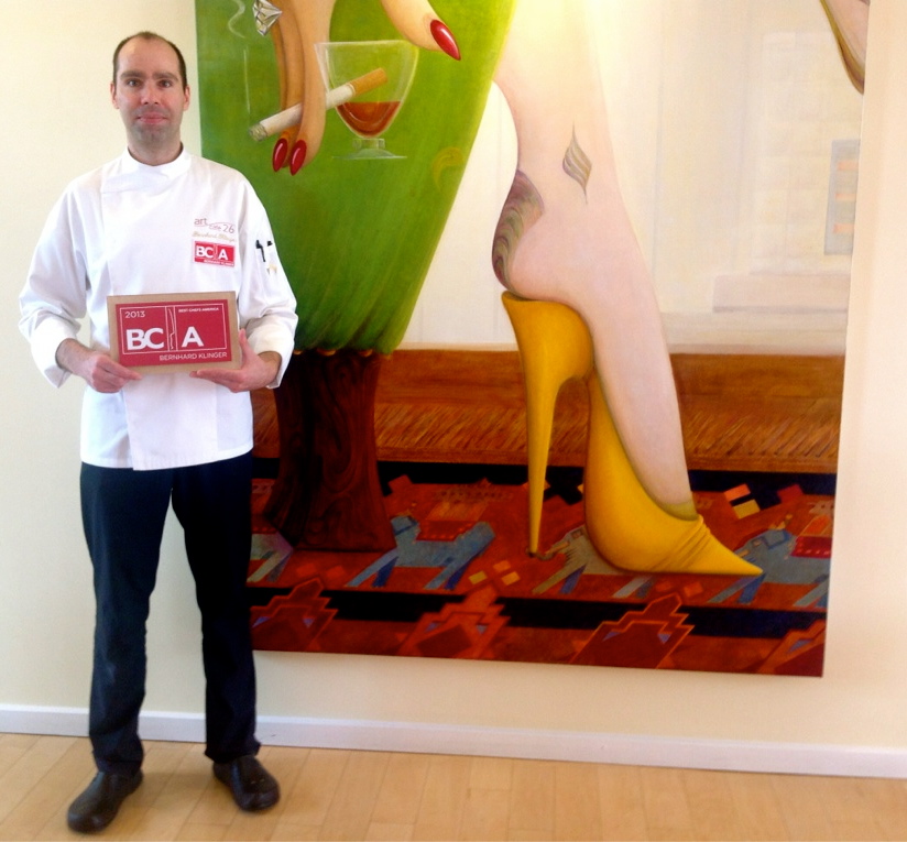 Chef Bernhard Klinger holds his Best Chefs America award. (Photo courtesy Abby Nurnberger/AA Communications)