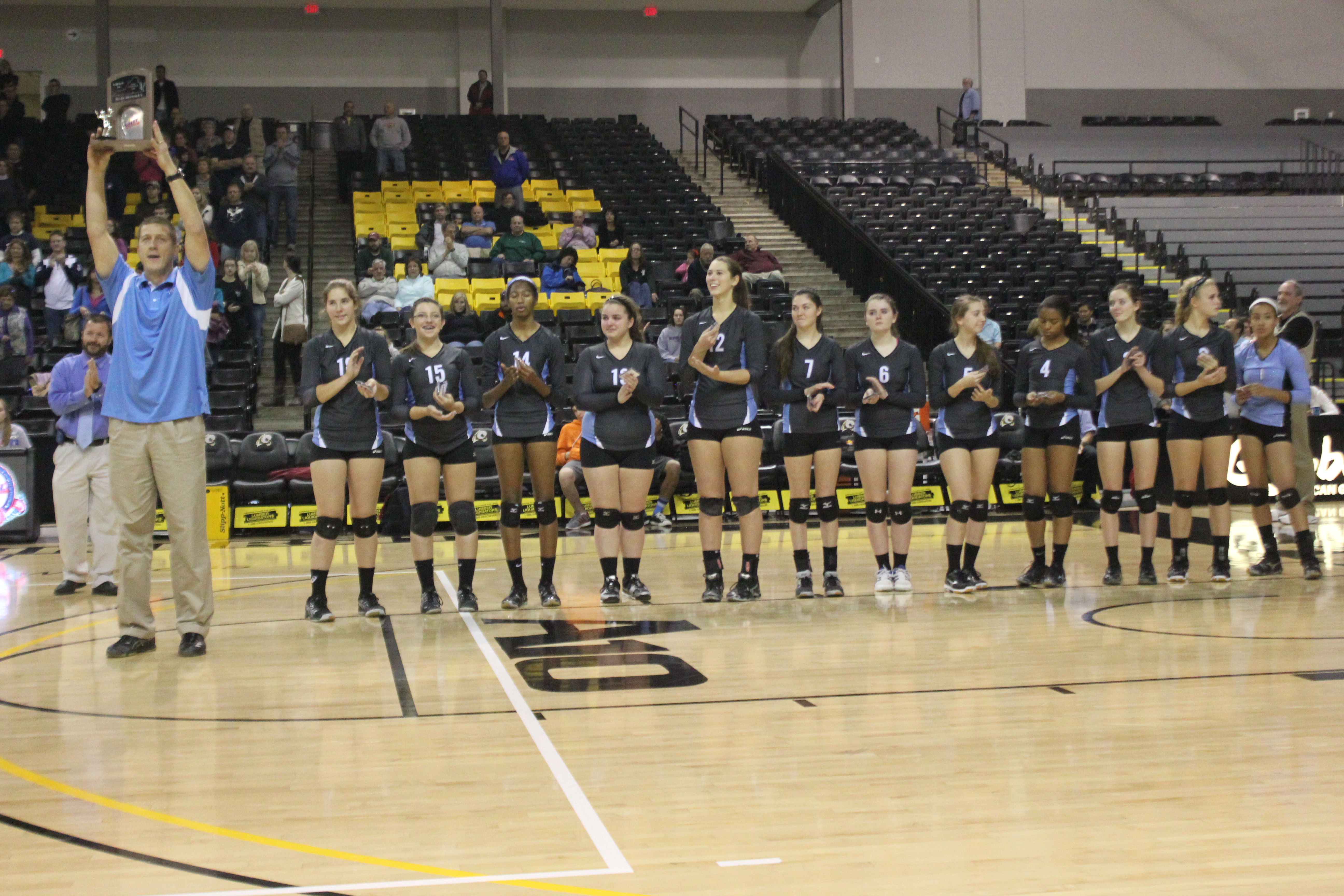 The Warhill volleyball team accepts its Group 3A State Championship runner-up trophy. (Nicole Trifone/WYDaily)
