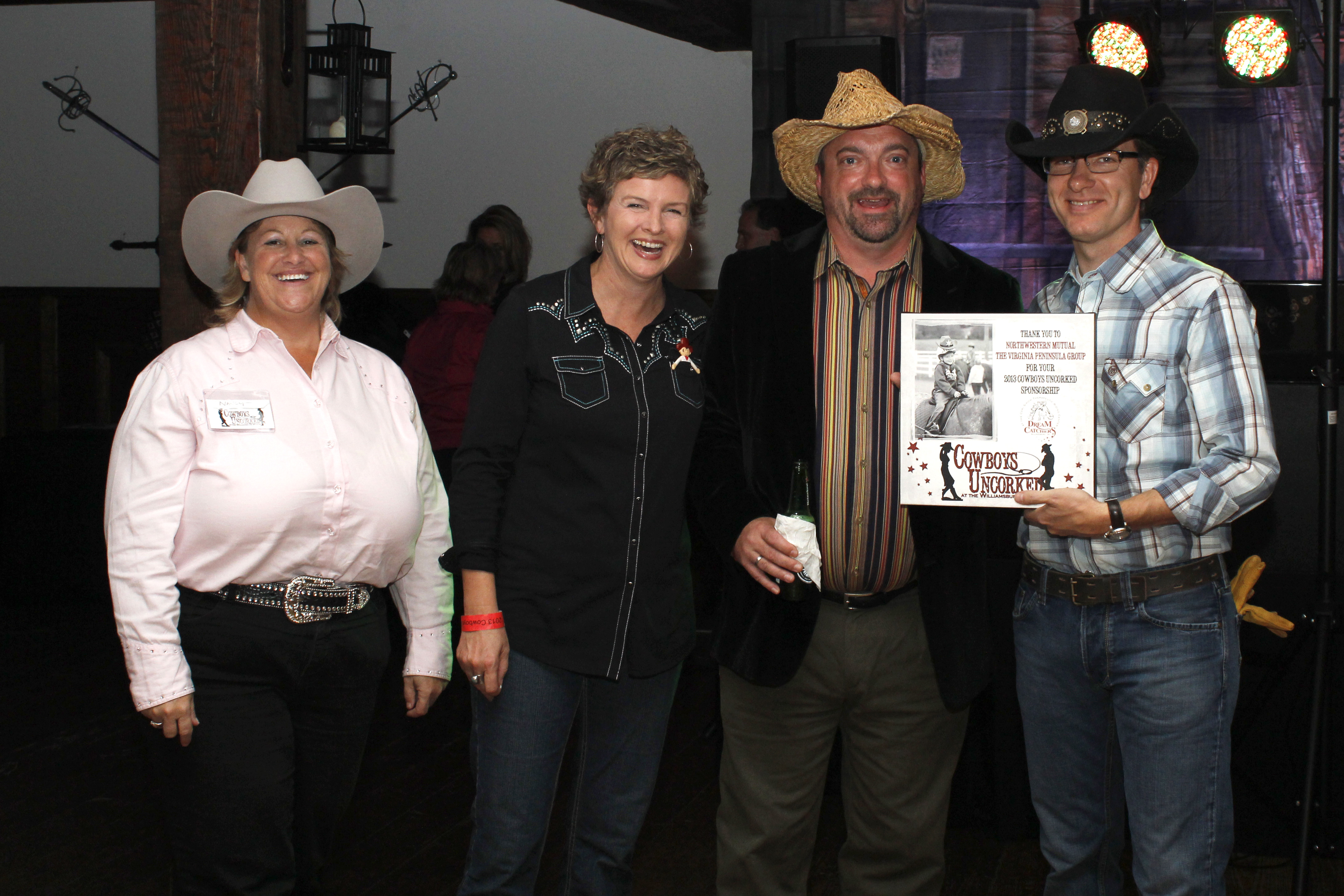 (L-R) Nancy Paschall, Executive Director for Dream Catchers; Tracy Shackelford with Northwestern Mutual – The Virginia Peninsula Group; Matthew Meyer of the Williamsburg Winery; Celebrity Arrestee Harold Philipsen, Managing Director with Northwestern Mutual – The Virginia Peninsula