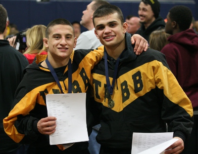 Tabb's Hunter Starner (left) and Bailey Hicks (right) show off their gold medals and completed brackets. (Will Armbruster/WYDaily)