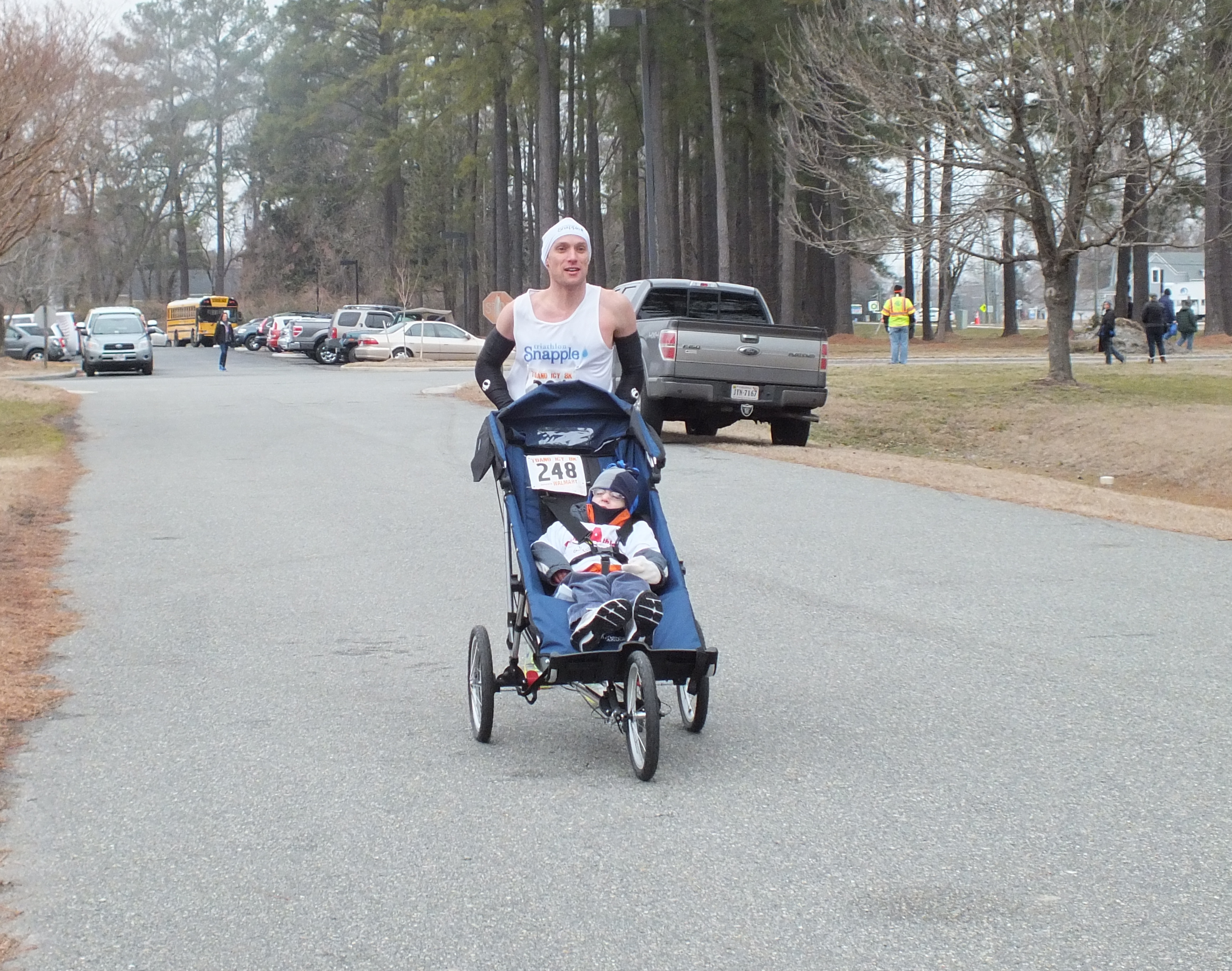 Adam Ostot pushes Ryan Wilson at the Toano Middle School Icy 8k (Hannah S. Ostroff/ WYDaily)
