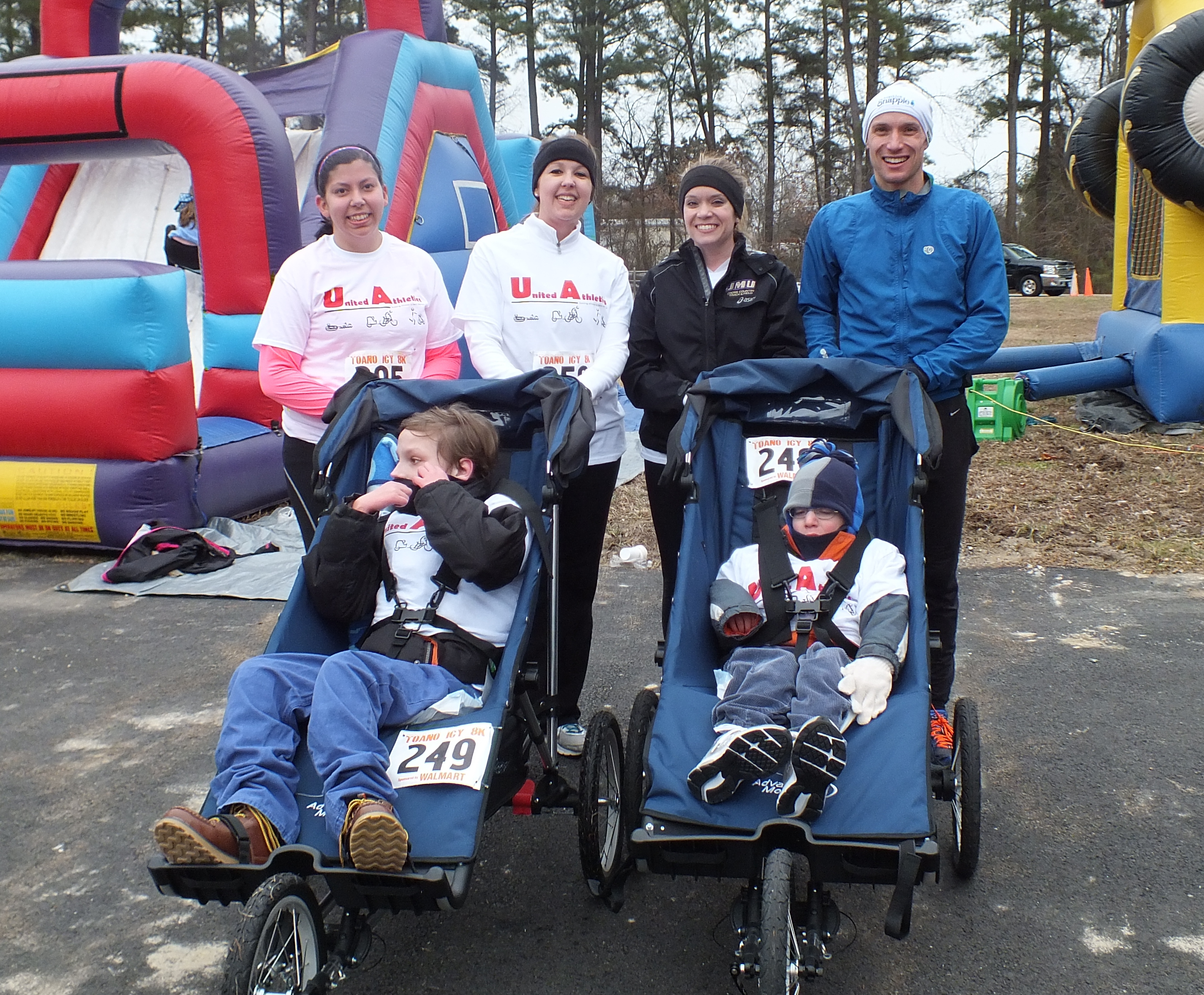 (L-R) Julia Ladnier, Melissa Natter, Kate Ostot and Adam Ostot with assisted athletes Alex and Ryan Wilson (Hannah S. Ostroff/ WYDaily)