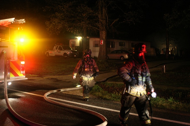 Firefighters responded to a fire Saturday at Marston's Trailer Park in James City County. One man was hospitalized with severe burns. (Photo courtesy James City County)
