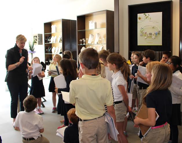 Hampton Roads Academy third grade students complete fieldwork at Hi-Ho Silver, a jewelry store with locations in Newport News, Williamsburg, Norfolk and Virginia Beach. Students interviewed owner Leslie Sink about how to start and run a business. (Submitted)