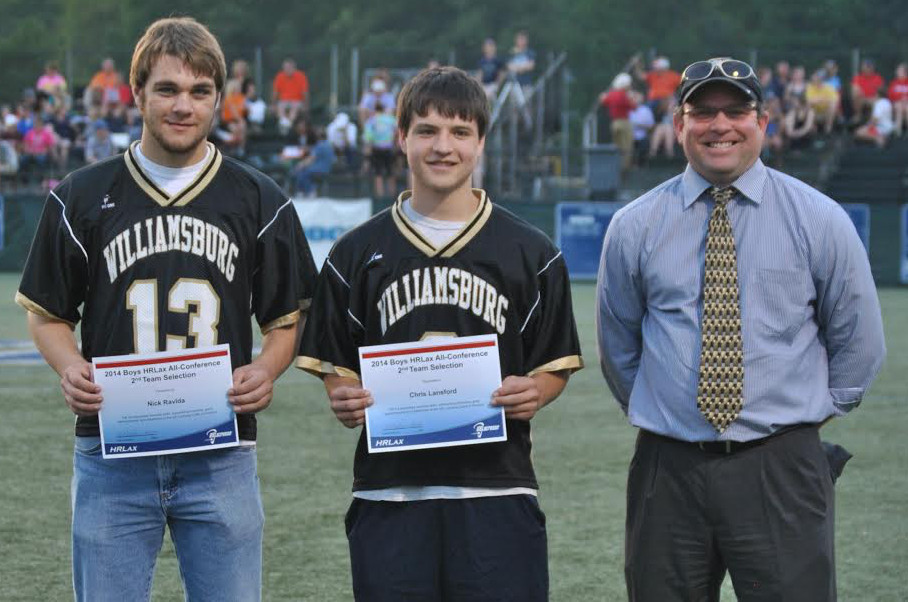 Nick Ravida (left) Chris Lansford (middle) of the Williamsburg Royals stand with their coach, Charlie Turner (right), after receiving their all-conference certificates. (Submitted photo)