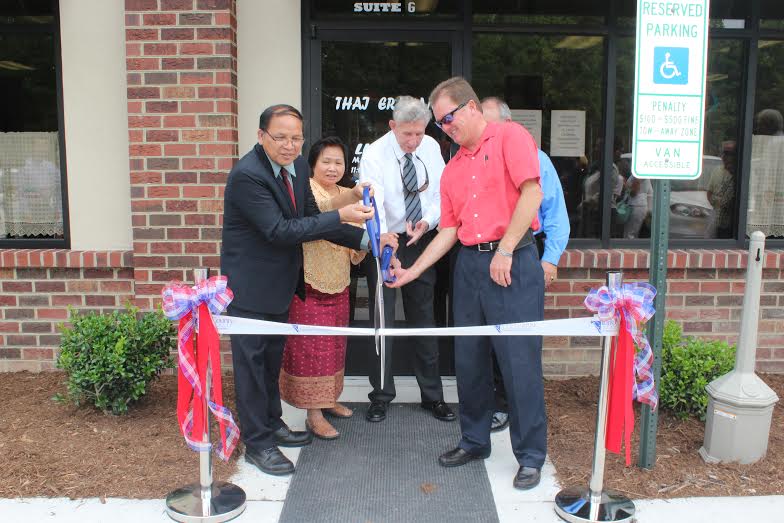 The owners of Thai Erawan restaurant hold a ribbon-cutting last month with Don Wiggins, York County Board of Supervisors Chair, and Tim Meyer of the York County Chamber of Commerce (Submitted)