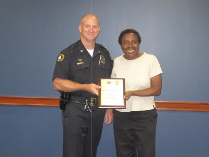 Chief Brad Rinehimer recently presented Sharon Abney with the Volunteer of the Year Award at the Volunteers in Police Service award dinner Aug. 26 (Submitted)