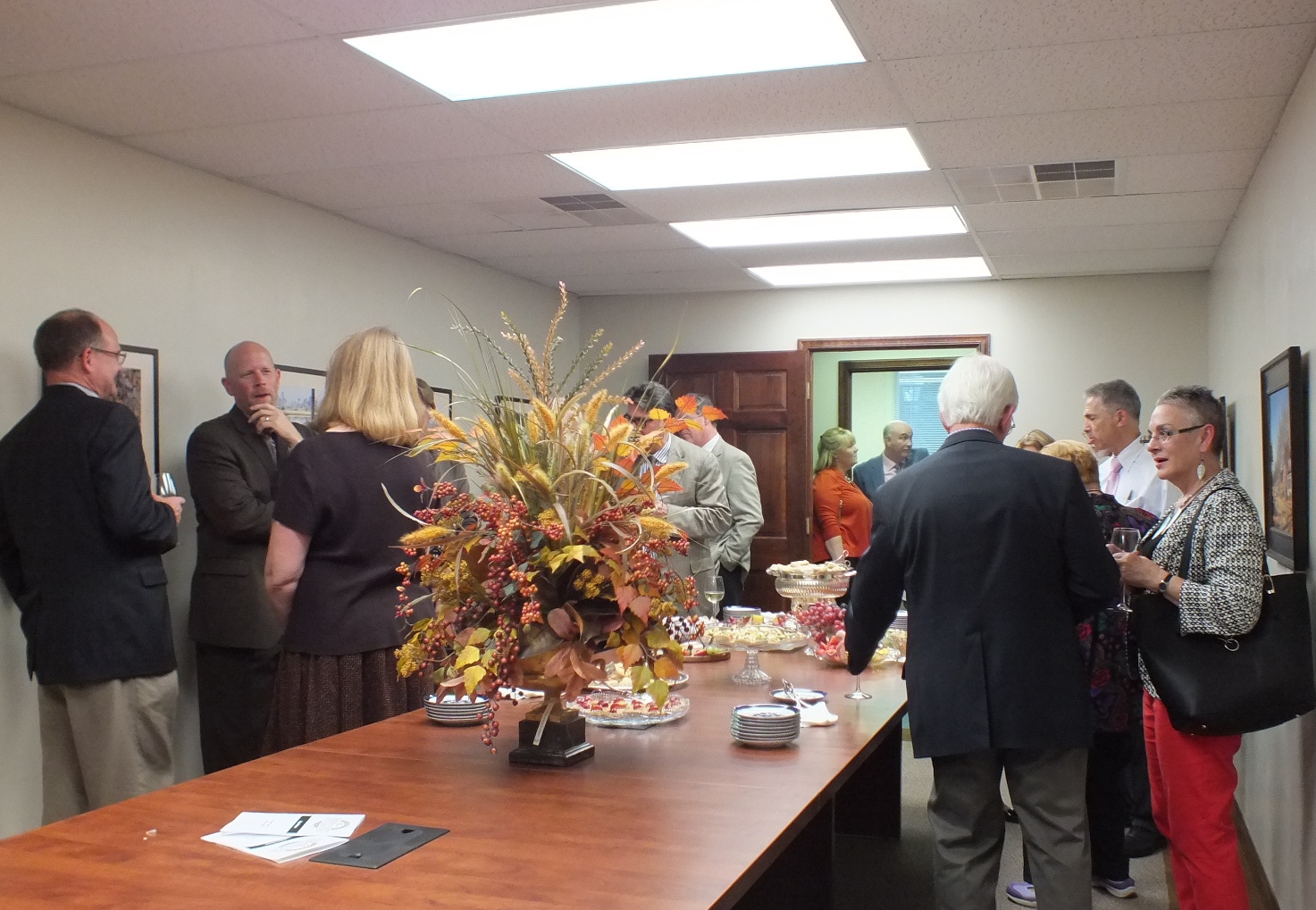 Residents gather in large conference room at the Williamsburg Community Foundation's new office for an open house Wednesday (Hannah S. Ostroff/WYDaily)