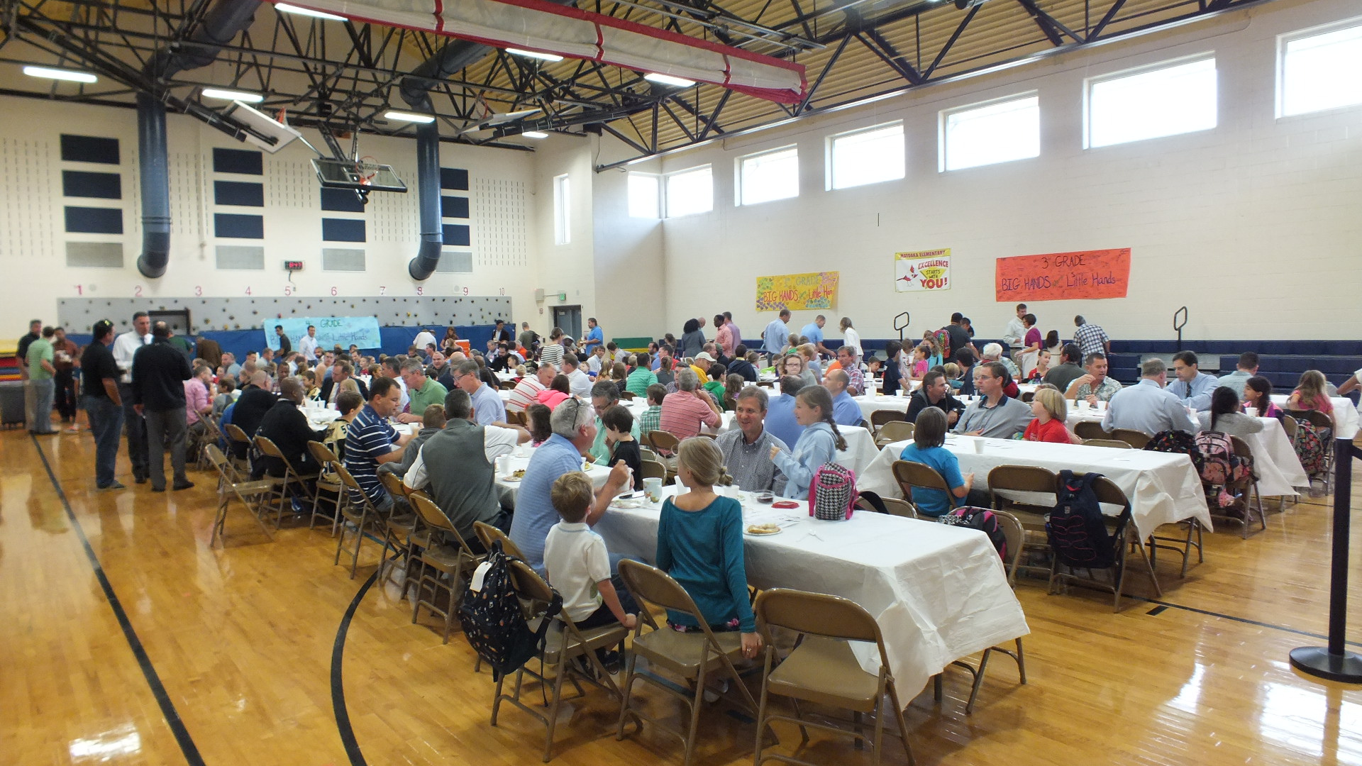 Matoaka Elementary School fathers gather in the school's gymnasium for the fifth-annual Morning with Dad. (Ian Brickey/WYDaily)