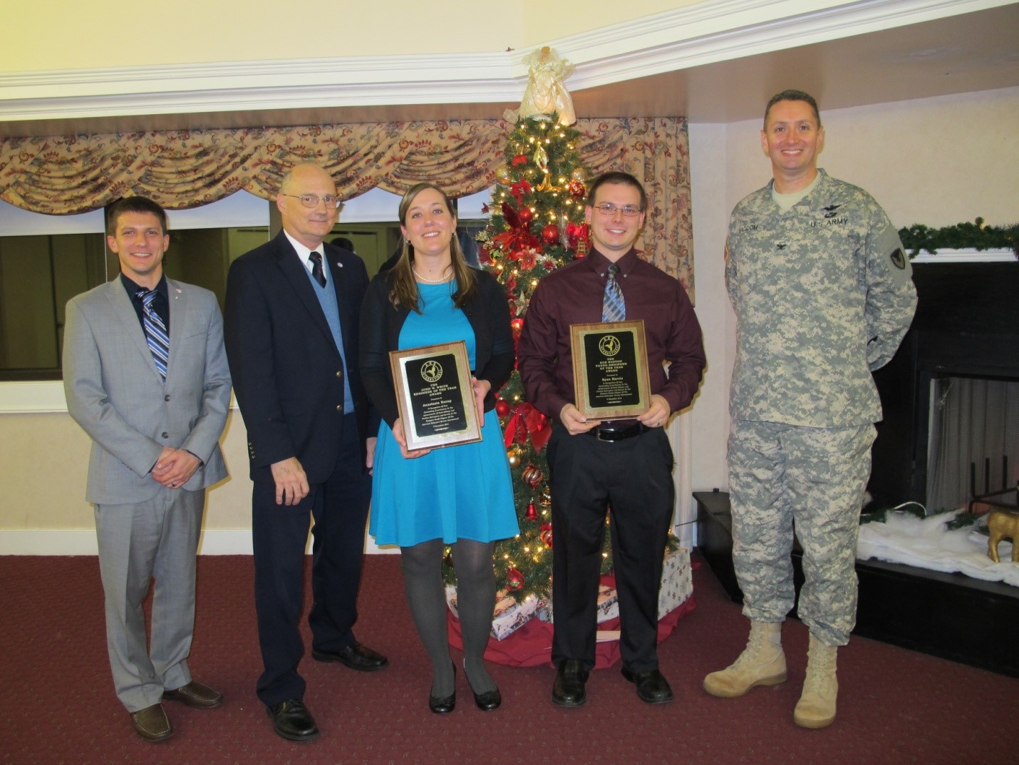 (L-R) Shawn Hefner, president of the Hampton Roads chapter of the American Helicopter Society; Dr. John Berry, deputy commander of the Aviation Applied Technology Directorate; Anastasia Kozup; Ryan Harris; and Col. Steven Braddom, commander of the Aviation Applied Technology Directorate (Submitted)