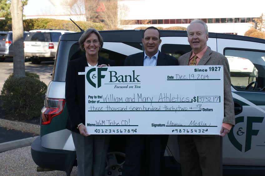 (L-R) Maureen Medlin, C&F Bank director of marketing, and Mark Eggleston, C&F Bank regional president Williamsburg/Peninsula present a check to Pete Kresky, director of corporate sales & sponsorships/athletics for the College of William and Mary (Submitted)