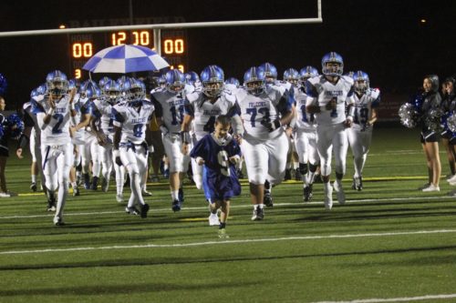 Mason Staley led the York High Falcons onto the field as an honorary captain. (Nicole Trifone/WYDaily)