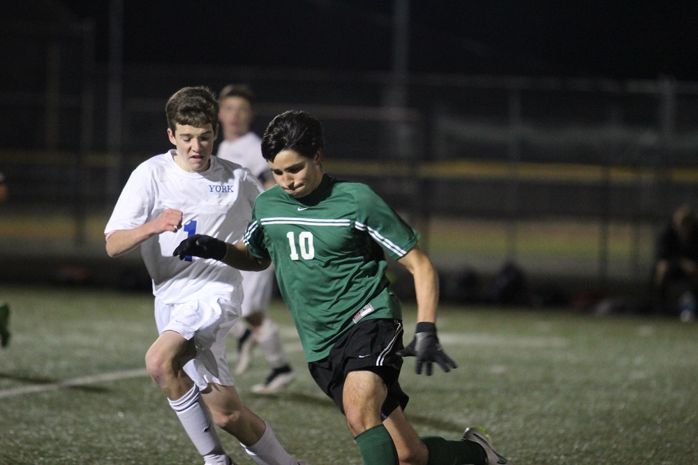 Andrew Maeso cuts to the goal against York. (Ty Hodges/WYDaily)