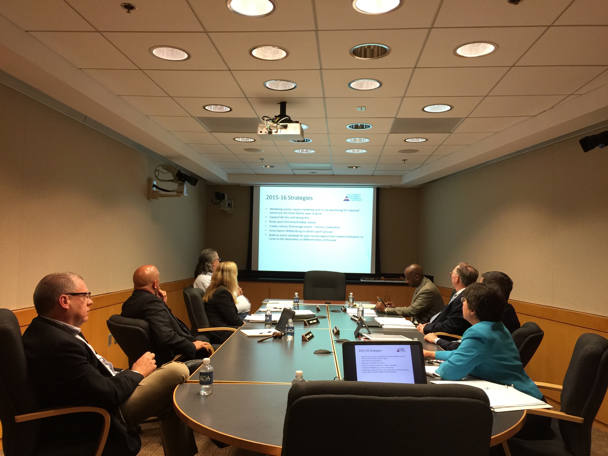 Greater Williamsburg Chamber & Tourism Alliance President and CEO Karen Riordan (right) talks about the Alliance's plans for 2015 with the James City County Board of Supervisors at a budget work session on Wednesday. (Gregory Connolly/WYDaily)