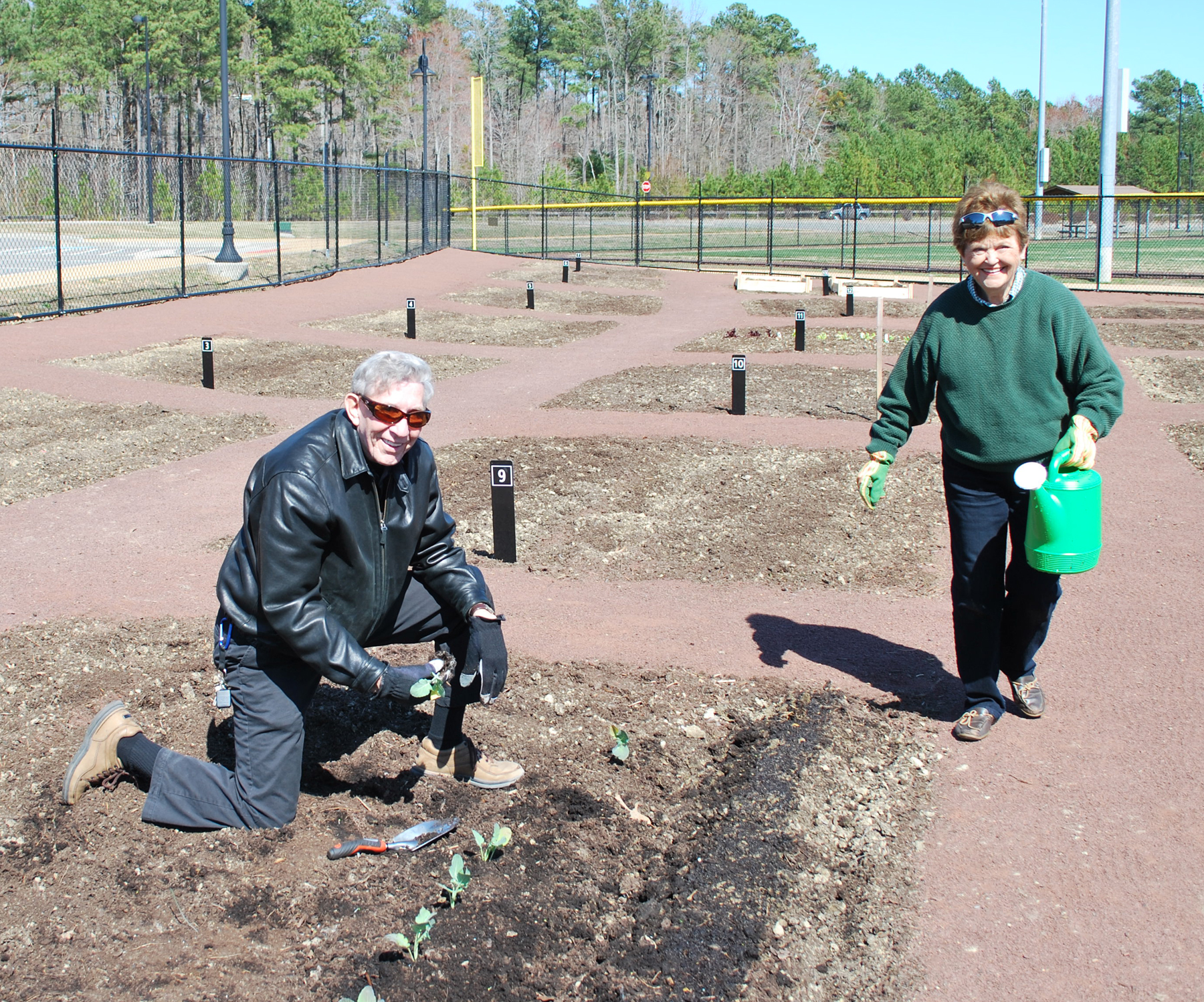 Supervisors Don Wiggins (District 3) and Sheila Noll (District 2) making the first plantings of the year in the York County Community Garden. (Courtesy of York County)