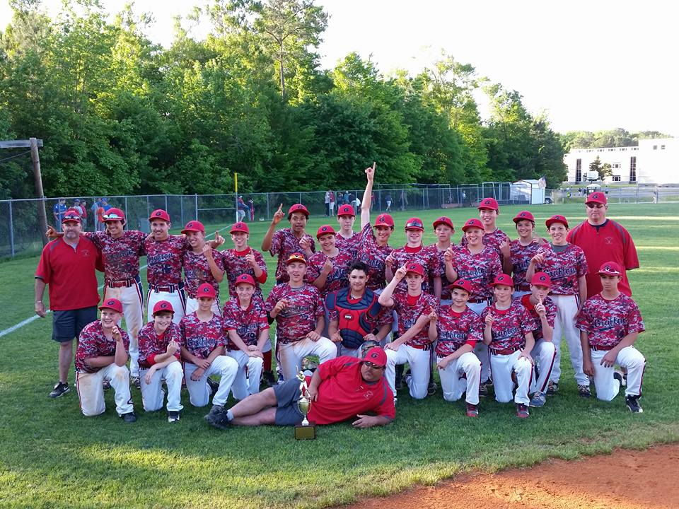 The Grafton Middle School baseball team celebrates after winning the Bay Rivers District title. (submitted photo)