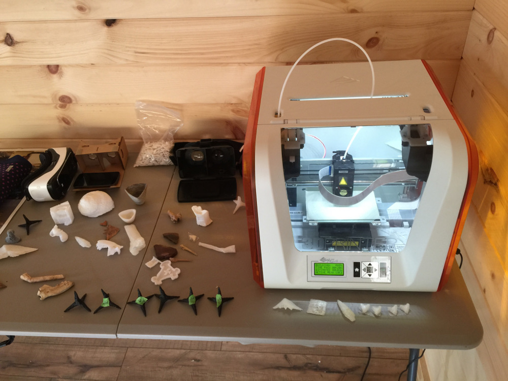The Ed Shed features a 3-D printing demonstration. The printer is pictured here, to the right. Several 3-D printed artifacts are on display. (Gregory Connolly/WYDaily)