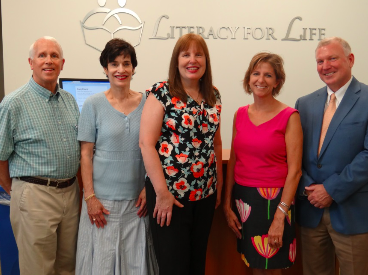 The new members Literacy for Life Board of Directors pose with the President of the Board for the coming fiscal year (from left to right): Bob Hershberger, Terry Murphy, Paula Mooradian, Kelly Ann Kelly, and Tom Spong.
