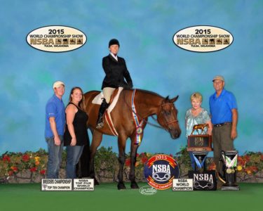 Shanda King sits atop her horse Angry Birds after winning a world championship. (Submitted)