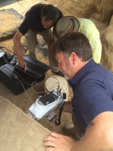 Senior Staff Archeologist Dave Givens takes a reading from the different levels of soil in the cellar with an x-ray fluorescence analyzer. (Elizabeth Hornsby/WYDaily)