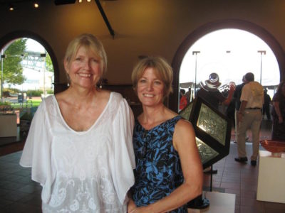 At a past "Opening Night,"  Maureen Moss (left), Chairman for the Virginia Symphony Orchestra Concert that takes place at Riverwalk Landing, poses with Leslie Viccellio, Chairman for "Opening Night." (Courtesy Terry Buntrock)