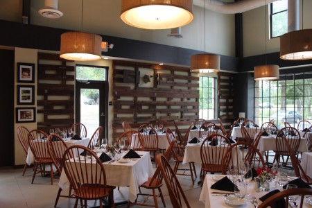 The wood that decorates the walls of Cochon on 2nd was repurposed from owner Neil Grigg's grandparents' Suffolk pig barn. (Elizabeth Hornsby/WYDaily)