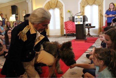 Liberty, Colonial Williamsburg's new mascot, interacts with Samantha Starzman at the Williamsburg Inn Sept. 17, 2015. (Kirsten Petersen/WYDaily)