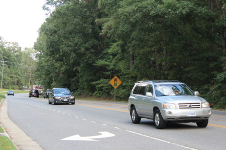 Commuters travel on Longhill Road Sept. 13, a roadway that James City County planners hope to widen in the coming years.