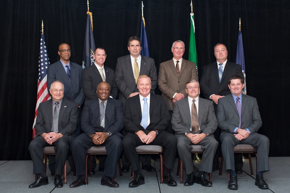 Front Row: Immediate Past President Chief Gary Roche (Pulaski); Third VP Chief Kelvin Wright (Chesapeake); President Chief Dave Sloggie (Williamsburg); First VP Chief Thierry Dupuis (Chesterfield County), Second VP Chief Chris Perkins (Roanoke). Back Row: At-Large Executive Board Members Chief DeWitt Cooper (Tazewell), Chief Doug Goodman (Ashland), Chief Howard Hall (Roanoke County), Chief Steve Sellers (Albemarle County) & Chief A.J. Panebianco (Middleburg). (Erin Schrad/VACP)