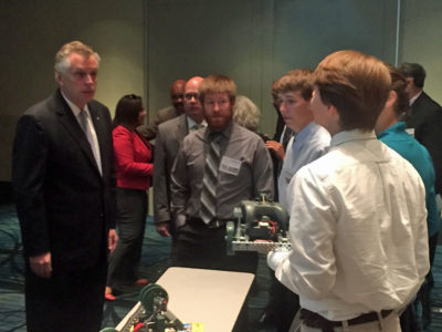 Virginia Gov. Terry McAuliffe speaks with Warhill PLTW students at the Virginia Workforce Conference Oct. 6. (Photo courtesy of Jeff Carroll)