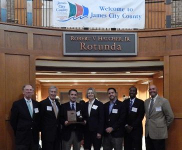 From left: Supervisor John McGlennon, Economic Development Authority Chair Marshall Warmer, Owens-Illinois Plant Manager Christopher Tonk, Owens-Illinois Human Resource Manager Karen Morris, Supervisor Kevin Onizuk, County Administrator Bryan Hill, and Board of Supervisors Chair Michael Hipple. (Courtesy James City County)