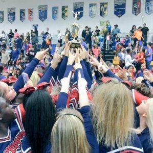 Grafton's cheer team celebrates its conference championship. (Photo courtesy Grafton athletics)