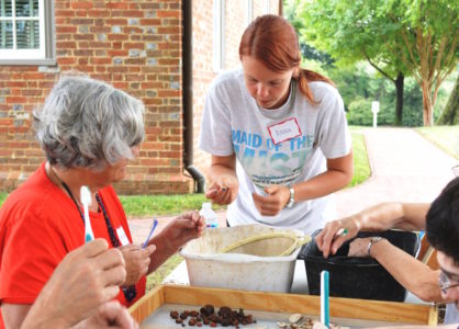 Archaeologist Anna Hayden, center, will help participants clean and sort artifacts at New Quarter Park on Saturday as part of the "Wash and Talk" program. (Courtesy NQP)