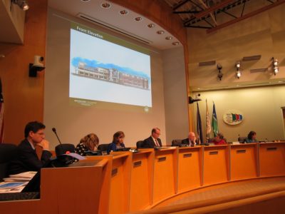 WJCC School Board members review a sketch of the front elevation for the fourth middle school during the Dec. 15, 2015 regular meeting. (Kirsten Petersen/ WYDaily)