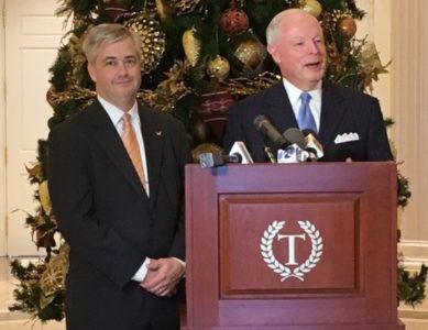 Chairman and CEO of TowneBank Robert Aston, Jr. (right) announces the merger with Brad E. Schwartz, CEO of Monarch Bank.