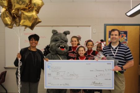 WJCC Schools Foundation Innovative Learning Grant recipient Paul Cosby with Berkeley principal Amour Mickel and the Berkeley Cheerleaders (Photo courtesy of the WJCC Schools Foundation)