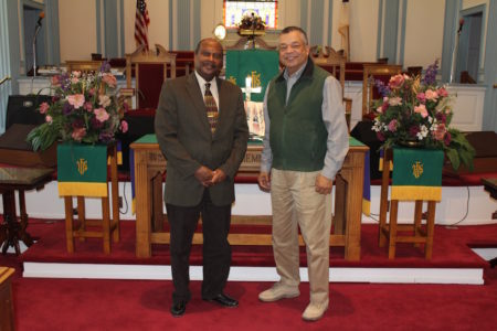 Rev. Dr. Reginald Davis and First Baptist Church member Nathaniel Brown in the church's sanctuary. (Elizabeth Hornsby/WYDaily)