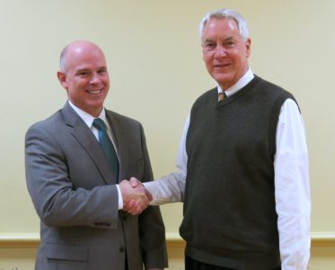 Todd Tyree, the new executive director of the Williamsburg Area Transit Authority, shakes hands with Mark Carter, chairman of the WATA Board of Directors, Jan. 20, 2016. (Submitted)