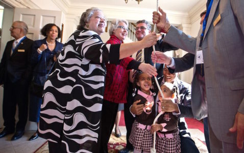 Descendants of Thomas Jefferson through both Martha Jefferson and Sally Hemings symbolically ring the newly restored church bell together. (Joseph Fudge, Daily Press)