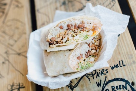 Karnage Asada serves a mash-up of Latin-Asian cuisine, such as their Elbow Droppin’ Burrito made with sushi rice, seasoned pinto beans, sweet and spicy Napa cabbage, oven roasted chicken, cheese and salsa.