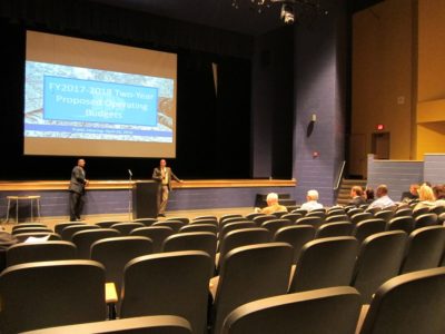 JCC County Administrator Bryan Hill and Board of Supervisors Chairman Michael Hipple (Powhatan) speak to a group of residents, elected officials and county staff at the first community meeting for the Fiscal 2017 operating budget April 7, 2016. (Kirsten Petersen/ WYDaily)