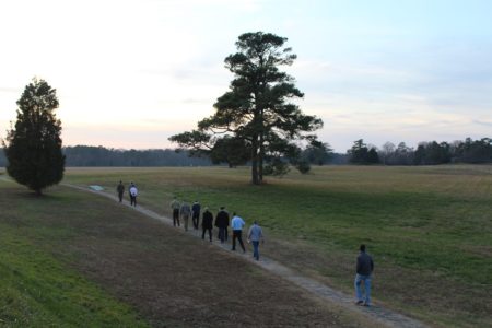 American, French and British air force officers walk toward the Yorktown Battlefield, the site of the last battle of the Revolutionary War, Dec. 12, 2015. (Photo by Kirsten Petersen)