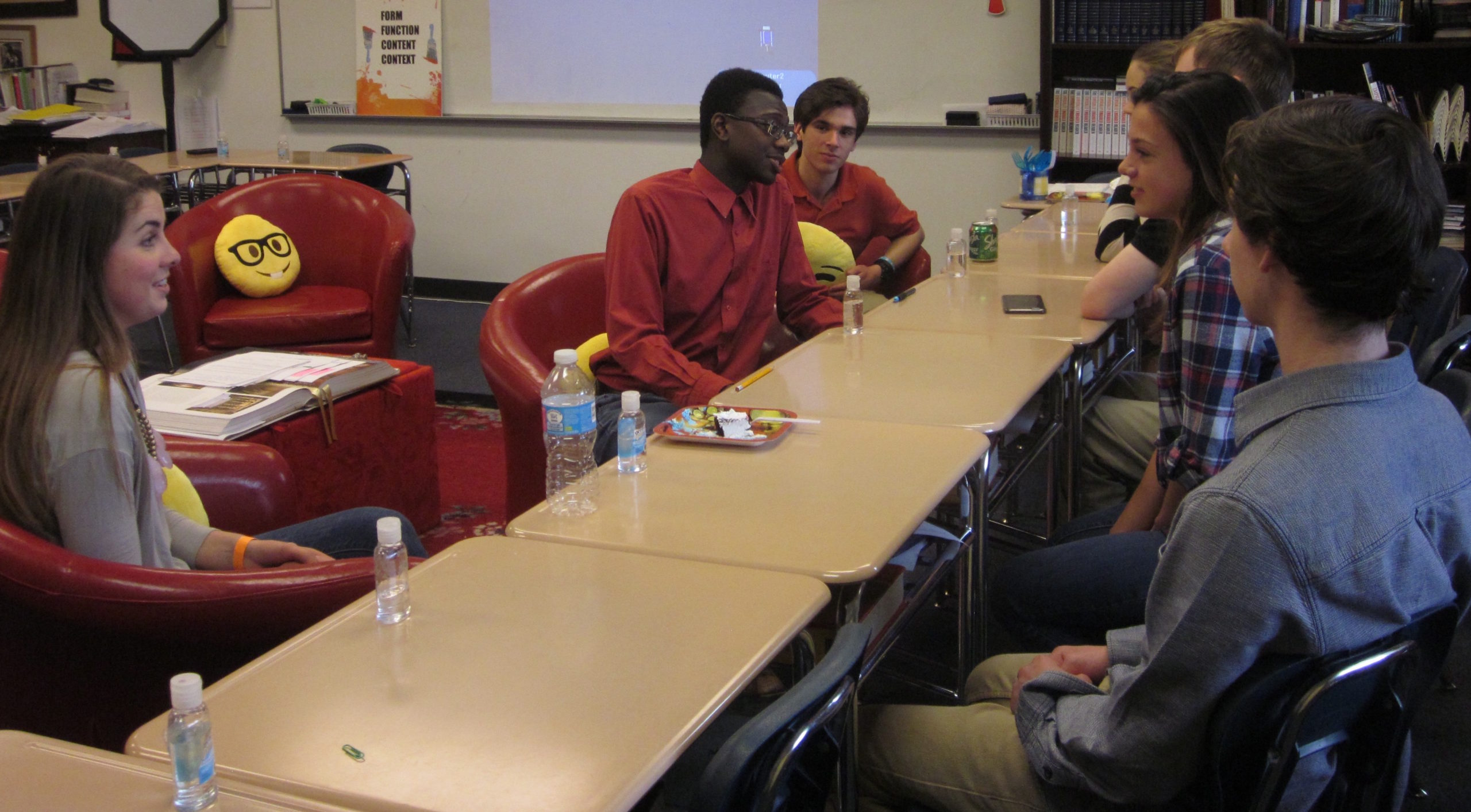 Students in Williamsburg Christian Academy's Leadership class celebrate the success of their recent projects and discuss their future plans. (Elizabeth Hornsby/WYDaily)