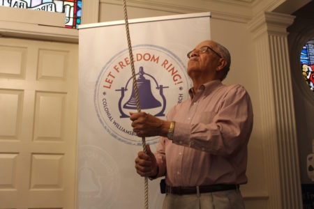 Bobby Braxton rings the bell at First Baptist Church as part of the Let Freedom Ring initiative. (Elizabeth Hornsby/WYDaily)