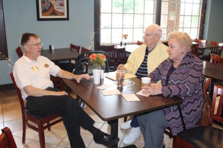 Members of Post 39 discuss Operation: MOM at Daily Donut. From left to right: Bill White, Ben Machinist, Barbara Machinist. (Elizabeth Hornsby/WYDaily)