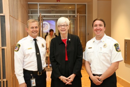 Outgoing city council member Judy Knudson (center) stands with members of the Williamsburg Police Department. (Photo courtesy of the City of Williamsburg)