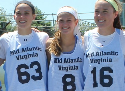 Camryn Mann (middle) poses with her teammates. 